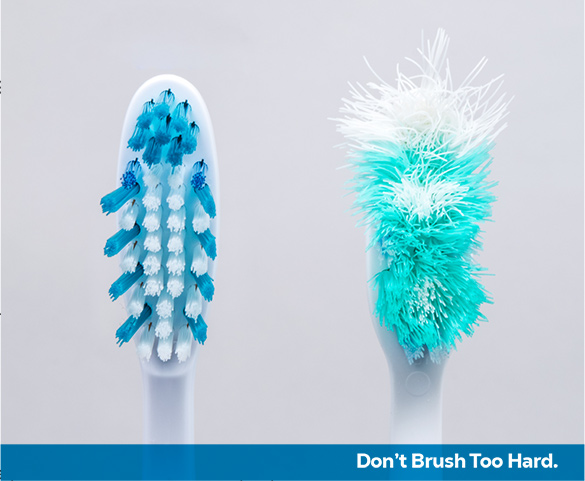 New and worn toothbrushes side by side.